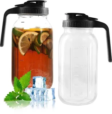 Imagen del producto de Jarra de vidrio con tapa y asa, ideal para diversos usos