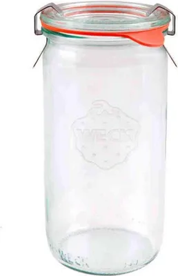 A clear glass jar with a lid and metal clasps.