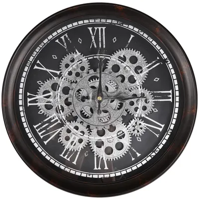A close-up view of a decorative wall clock with a steampunk-inspired design.