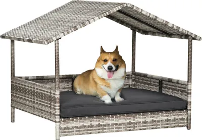 Produktbild von PawHut Rattan Hundehaus mit Kissen, Hundebett im Hausform, Outdoor Hundehütte für kleine, mittlere Hunde, Stahlrahmen, Grau, 69 x 98 x 70 cm