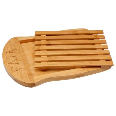 A wooden bread cutting board with a slatted top section, shown from a diagonal top-down view against a white background.