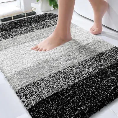 Imagen del producto de Alfombrilla de baño de microfibra de lujo con base de goma, color