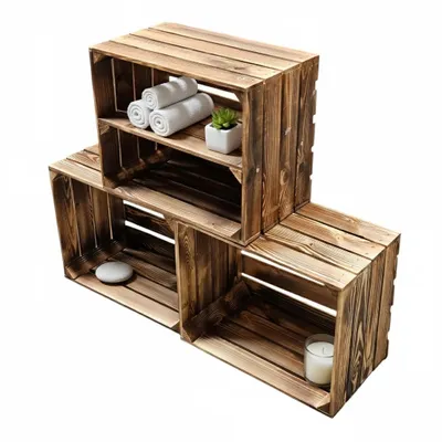 Three wooden crates stacked and arranged to form shelves.