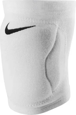A close-up view of a white Nike volleyball knee pad.