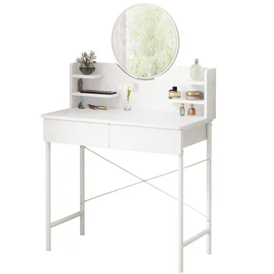 A white vanity desk with a mirror and shelves, displaying makeup and decorative items.