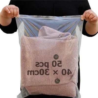 Immagine prodotto di Set di sacche da viaggio e contenitori, 50 pezzi, sacchetti trasparenti, organizer impermeabile per abbigliamento, scarpe e articoli da toilette, dimensioni 30 x 40 cm
