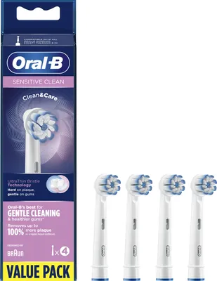 A box of Oral-B Sensitive Clean toothbrush heads and four individual toothbrush heads.