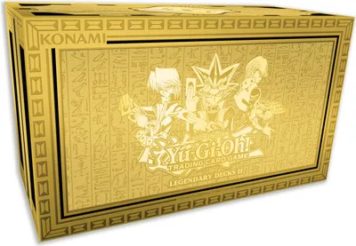 A golden box with Egyptian-like hieroglyphs and characters from the Yu-Gi-Oh! trading card game.