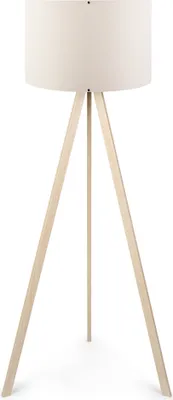 A floor lamp with a cream-colored shade and a wooden tripod base.