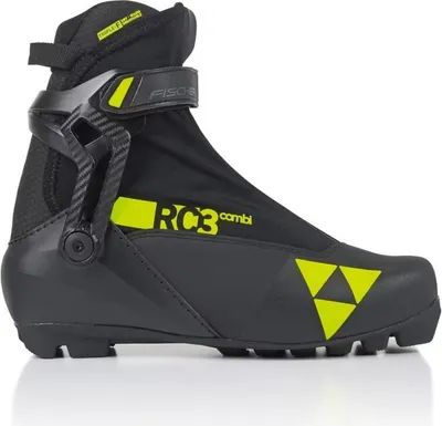 A single black and yellow cross-country ski boot is shown against a white background.