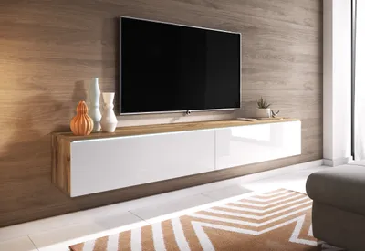 A modern living room with a wall-mounted TV and media console.