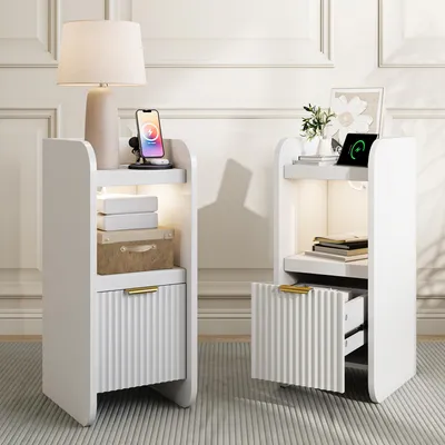 Immagine prodotto di Set di 2 comodini, dimensioni 30x25x60 cm, con presa di corrente e porta USB, illuminazione, 1 cassetto con chiusura ammortizzata, ripiano aperto. Comodini per camera da letto, colore bianco