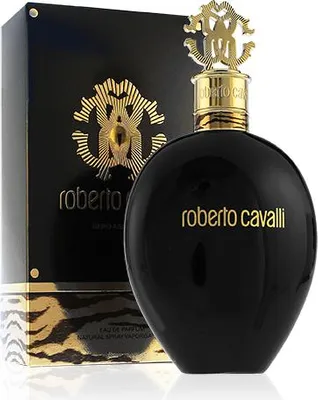 A black perfume bottle with a gold cap and gold lettering, next to its black and gold patterned box.