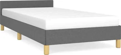 A dark gray bed frame with a white mattress on a white background.