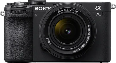 A close-up front view of a black Sony Alpha 7C camera with a lens attached, set against a white background.