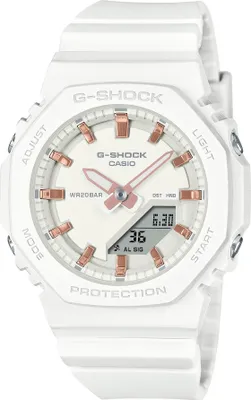 A white Casio G-Shock watch with rose gold accents is shown from the front against a white background.