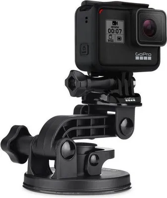 A black GoPro camera mounted on a suction cup holder against a white background.