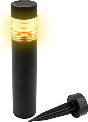 A black solar garden light with a yellow glow is shown on a white background, with a separate stake accessory.