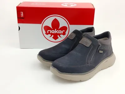 Imagen del producto de Bota de tobillo para hombre Rieker, con dos cremalleras, color negro con talón marrón, talla 41