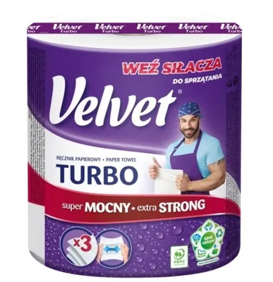 A roll of Velvet Turbo paper towels with a man depicted on the packaging.