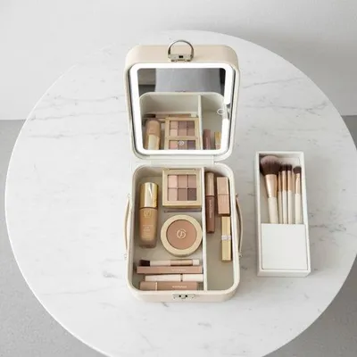 Productafbeelding van OMNIEXA Make-up Tas met Spiegel en LED – Organizer – Cosmetica Opbergbox - Sieradendoos met LED-spiegel –Juwelendoos - compact – 3 lichtkleuren