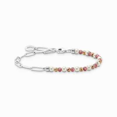 A close-up studio shot of a bracelet on a white background.