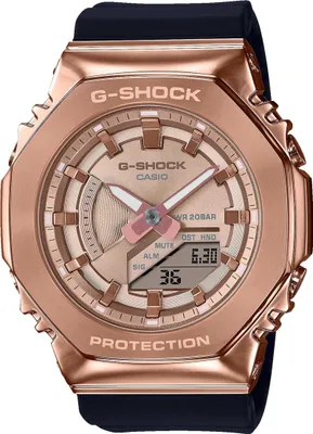A close-up studio shot of a rose gold Casio G-Shock watch against a white background.