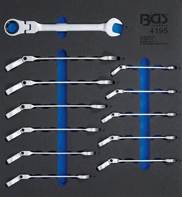 A set of ratcheting wrenches laid out in a tool organizer.