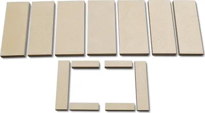 A collection of beige rectangular pieces arranged in two rows against a white background.