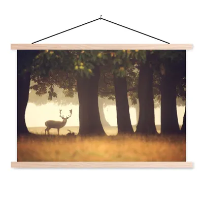 Produktbild von MuchoWow® Textilposter Hirsche - Bäume - Wald 60x40 cm mit holzfarbenen Rahmen - Bilder
