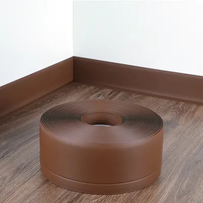 Obrázok produktu pre QUEST Mäkká soklová lišta Samolepiaca, Flexibilná soklová lišta, Rohová soklová lišta, PVC, 70x20mm, hnedá, 25m