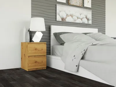 A bedroom scene with a nightstand and bed.