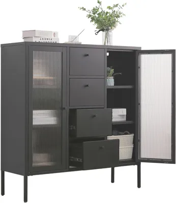 A dark gray metal highboard with glass doors and drawers, displayed in a studio setting with a plant and books on top.