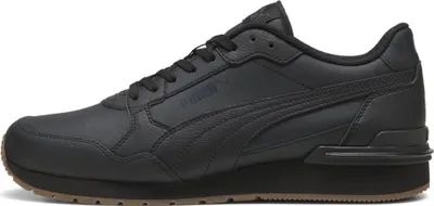 A black Puma sneaker is shown from the side against a white background.