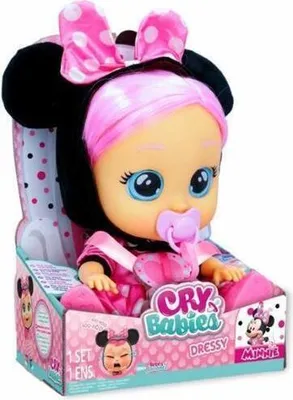 A Cry Babies Dressy Minnie doll in its packaging.