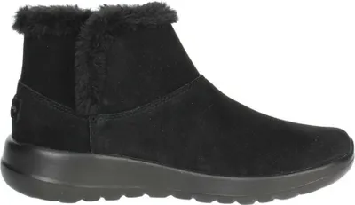 A side view of a black Skechers boot.