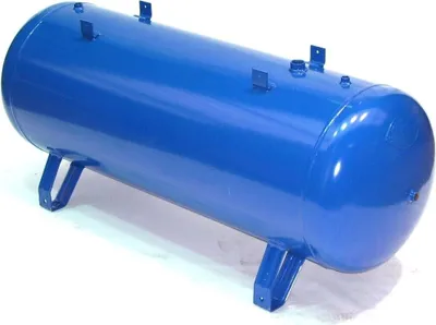 A blue cylindrical pressure vessel with support legs, shown in a studio setting.