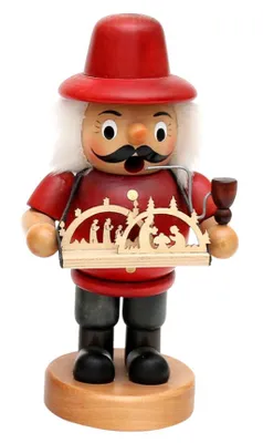 Räuchermännchen stellt eine Figur mit einem roten Hut, einem roten Hemd und einer Pfeife dar.