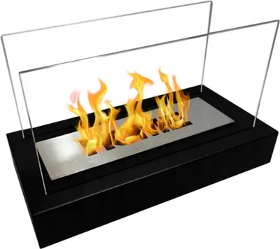 A freestanding bio-fireplace with glass wind guards.