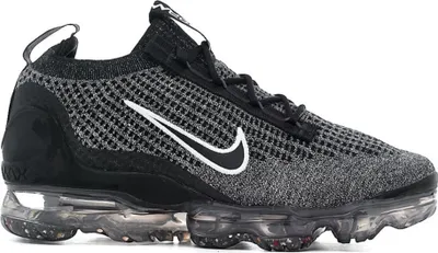 A side view of a Nike Air Vapormax 2021 FK GS shoe against a white background.