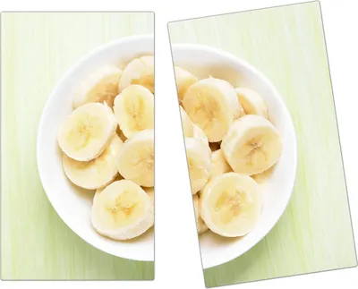 Produktbild von Spritzschutz Herdabdeckplatte Schneidebrett aus Glas Bananen auf Teller 2-Teilig (60x52cm)