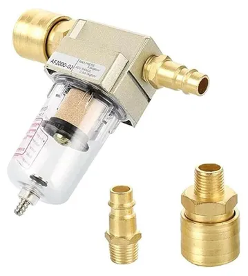 A product shot of an air compressor filter and accessories on a white background.
