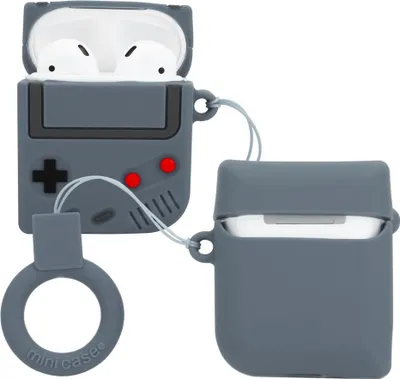 Two silicone cases for Apple AirPods, one shaped like a retro game console and the other a simple case, are displayed against a white background.