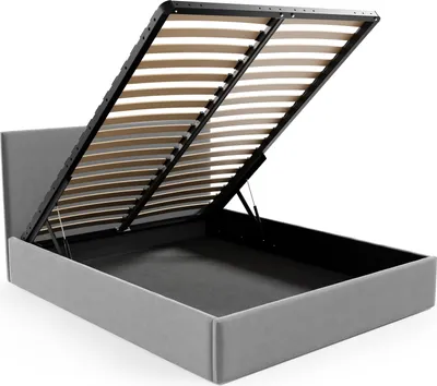 A bed frame with the mattress support lifted to reveal the storage space underneath.