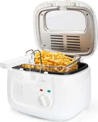 A white electric deep fryer filled with french fries, with its lid open.