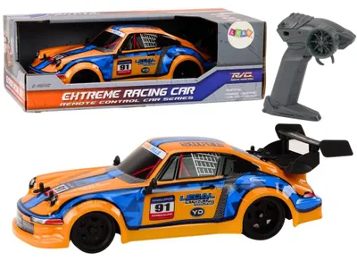 Immagine prodotto di Macchinina telecomandata RC in scala 1:16 con ruote in gomma, modello da drift, colore arancione