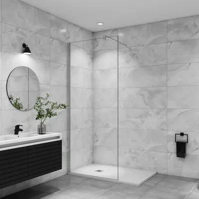 A modern bathroom with a walk-in shower, vanity, and mirror.
