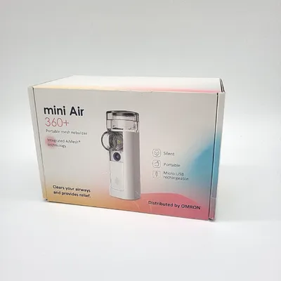 The image shows the retail packaging of a portable mesh nebulizer.