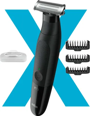 A black Braun XT3100 body groomer with attachments and a protective cap is displayed against a large blue 'X' graphic on a white background.