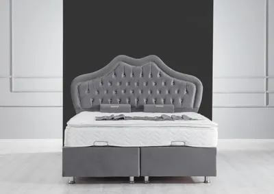 Zdjęcie produktu dla Łóżko podwójne Bett Grau, model Chesterfield, obita tkaniną, z materacem sprężynowym, wymiary 160x200 cm
